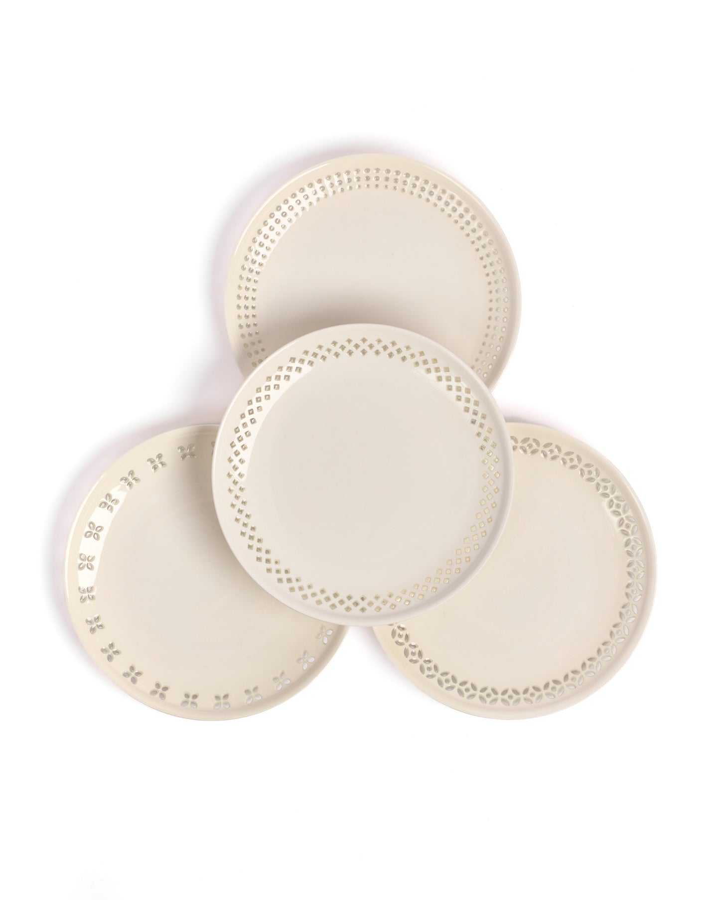 Set of 4 Ivory cut out detailing plates